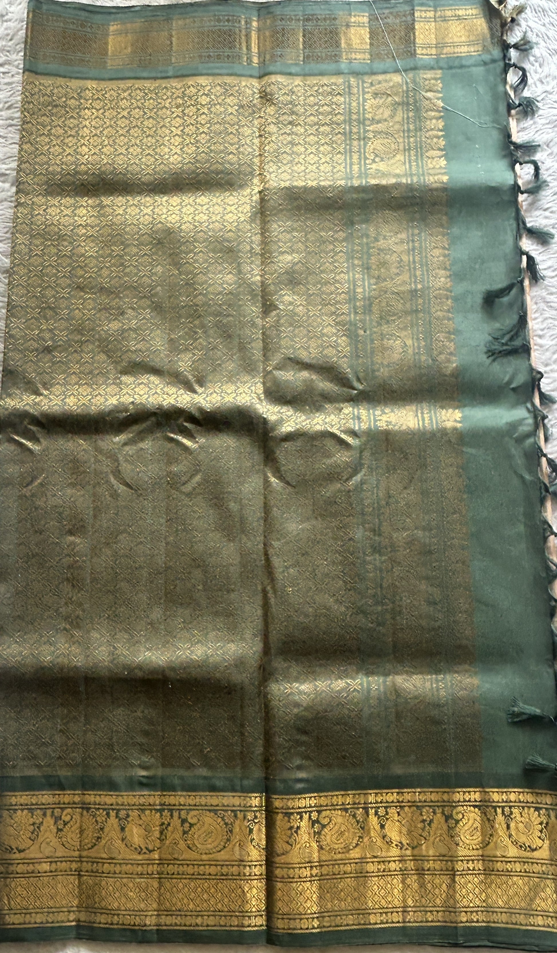 Gadwal Silk Saree Peach Colored Complemented With a Zari Border - Sampradaya Designer Studio