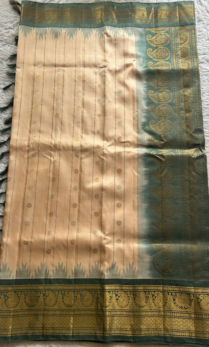 Gadwal Silk Saree Peach Colored Complemented With a Zari Border - Sampradaya Designer Studio