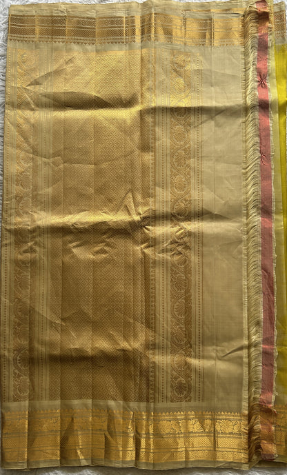 Gadwal Silk Saree Lemon Yellow Colored Complemented With a Zari Border - Sampradaya Designer Studio