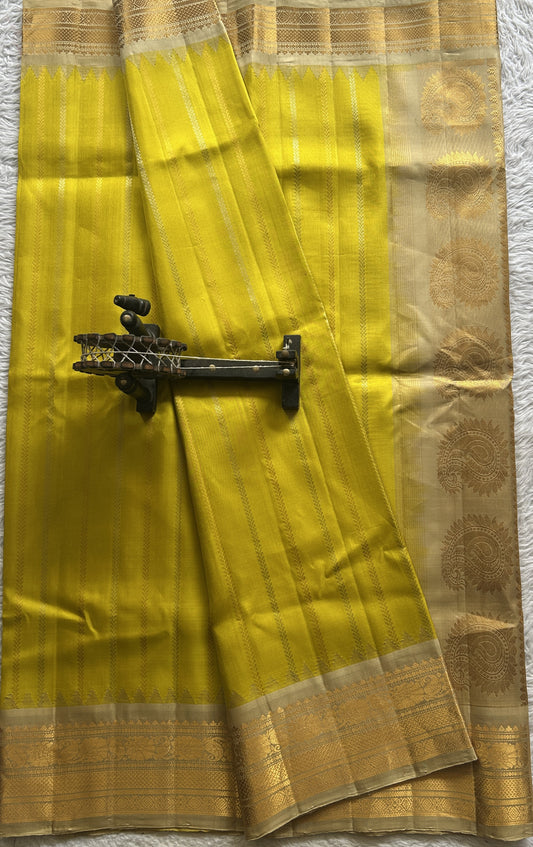 Gadwal Silk Saree Lemon Yellow Colored Complemented With a Zari Border - Sampradaya Designer Studio