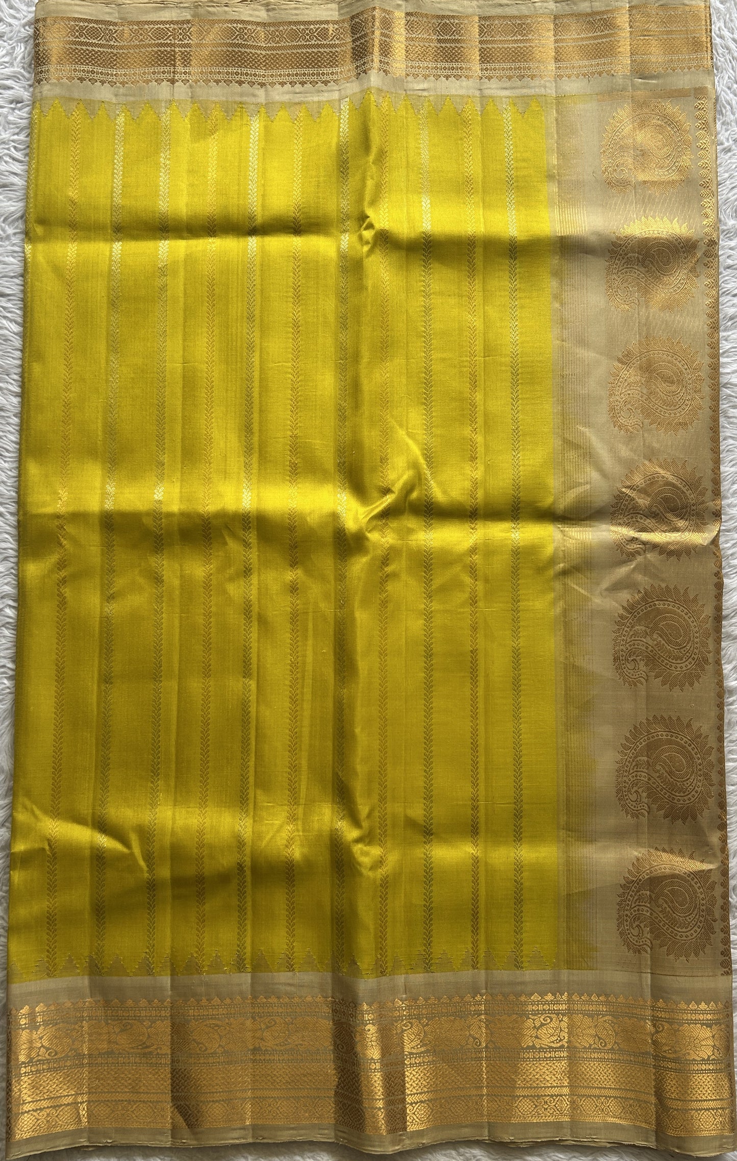 Gadwal Silk Saree Lemon Yellow Colored Complemented With a Zari Border - Sampradaya Designer Studio