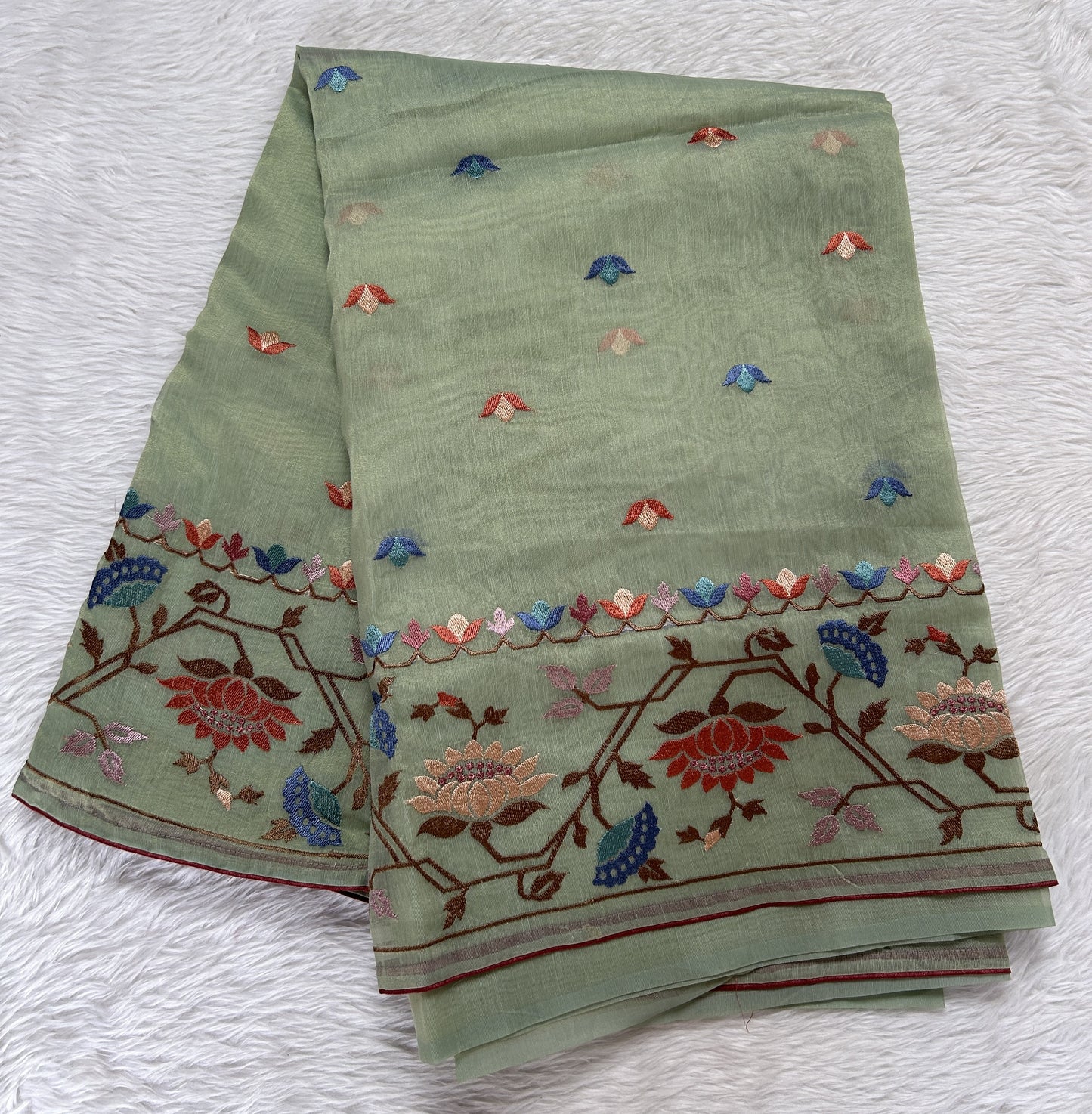 Semi Tussar Designer Saree Pastel Green colored Saree complemented with a Machine Embroidery border. - Sampradaya Designer Studio