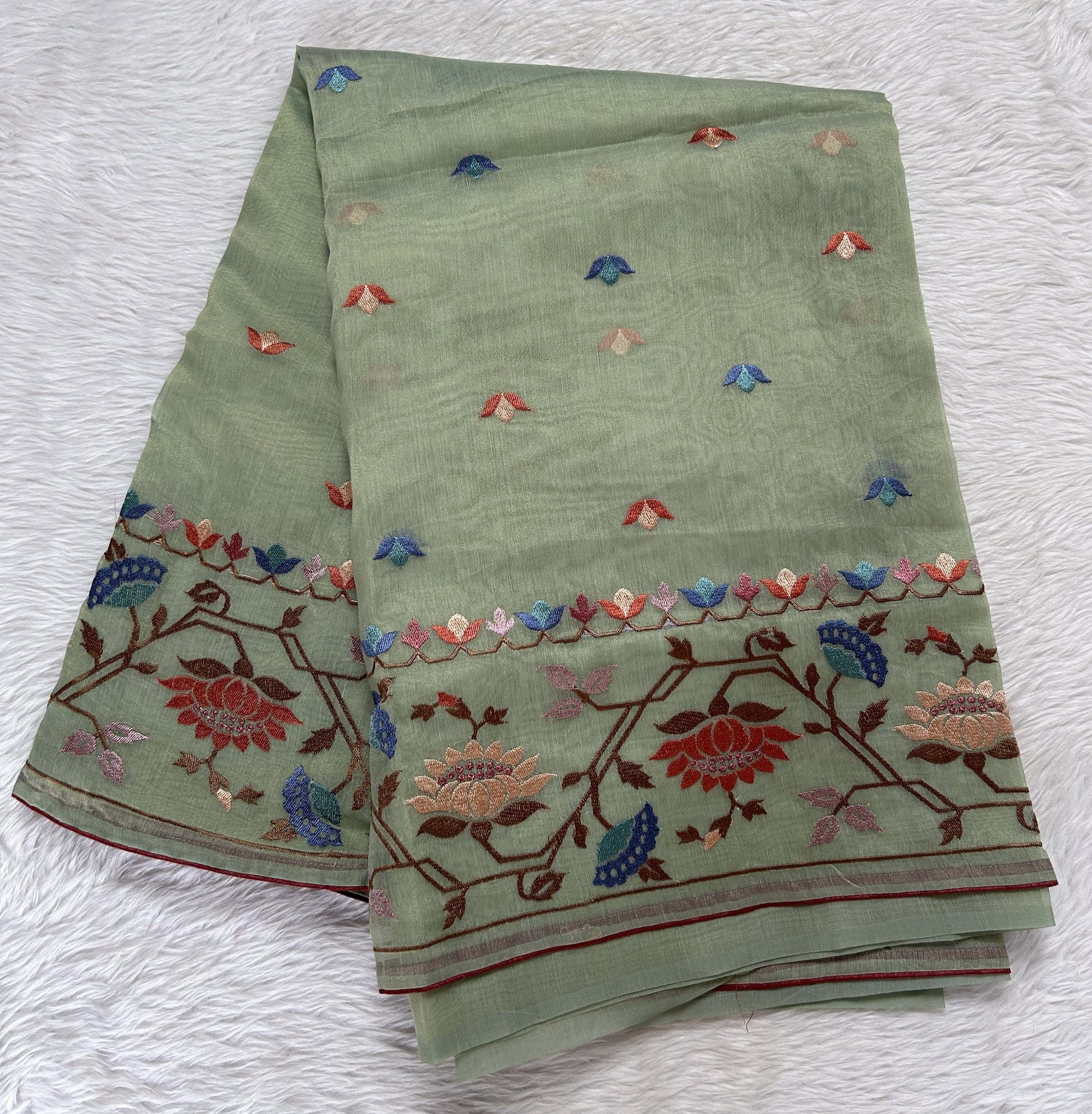 Semi Tussar Designer Saree Pastel Green colored Saree complemented with a Machine Embroidery border. - Sampradaya Designer Studio