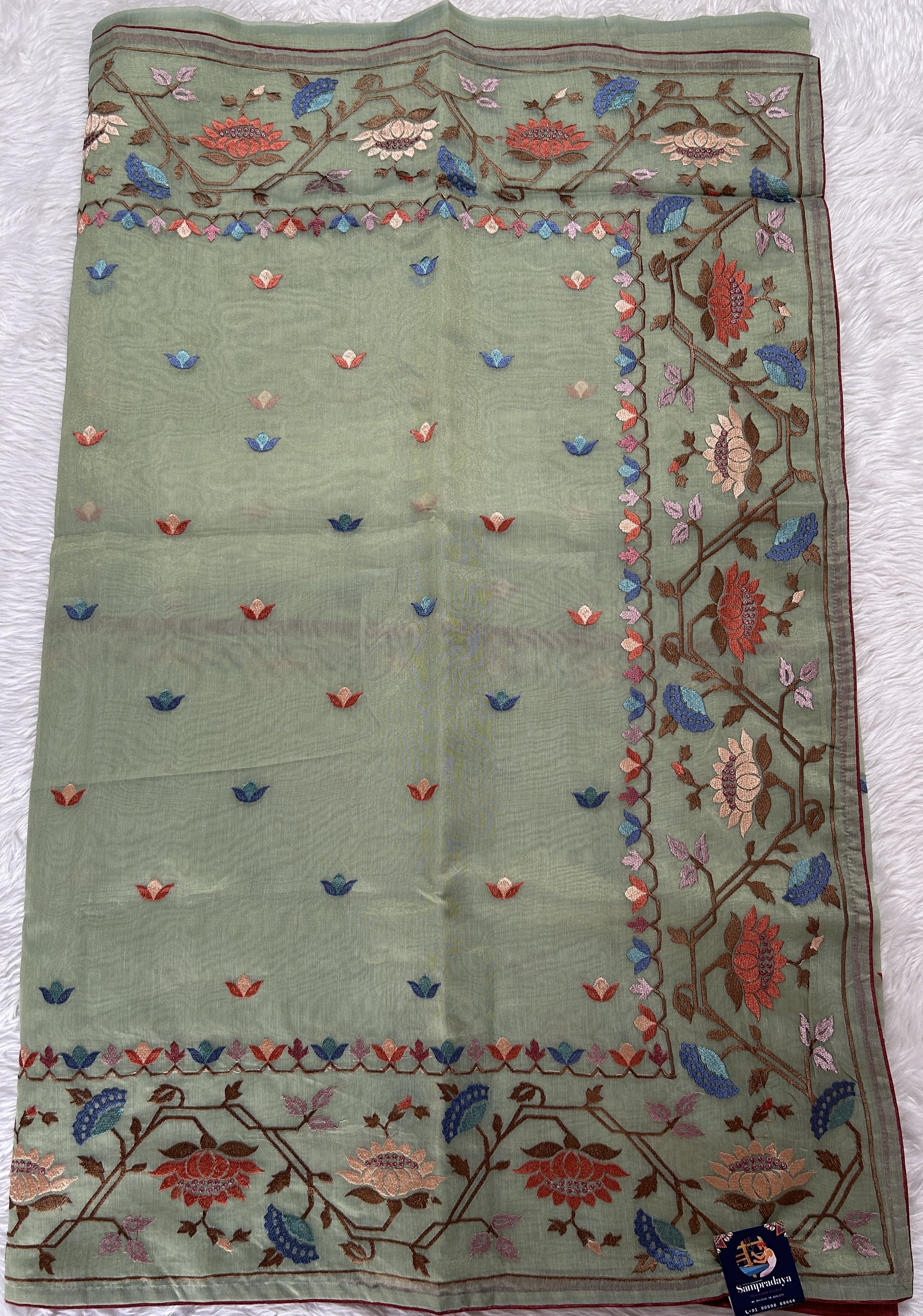 Semi Tussar Designer Saree Pastel Green colored Saree complemented with a Machine Embroidery border. - Sampradaya Designer Studio
