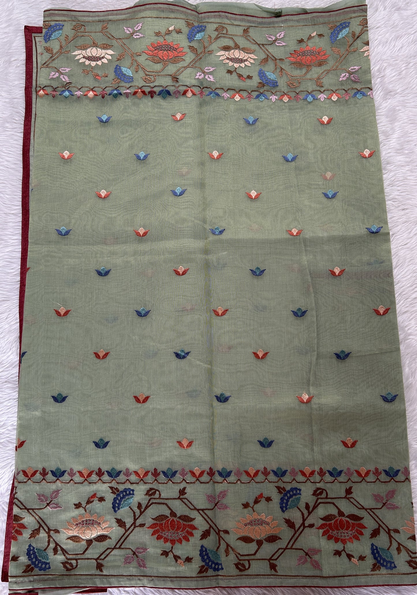 Semi Tussar Designer Saree Pastel Green colored Saree complemented with a Machine Embroidery border. - Sampradaya Designer Studio