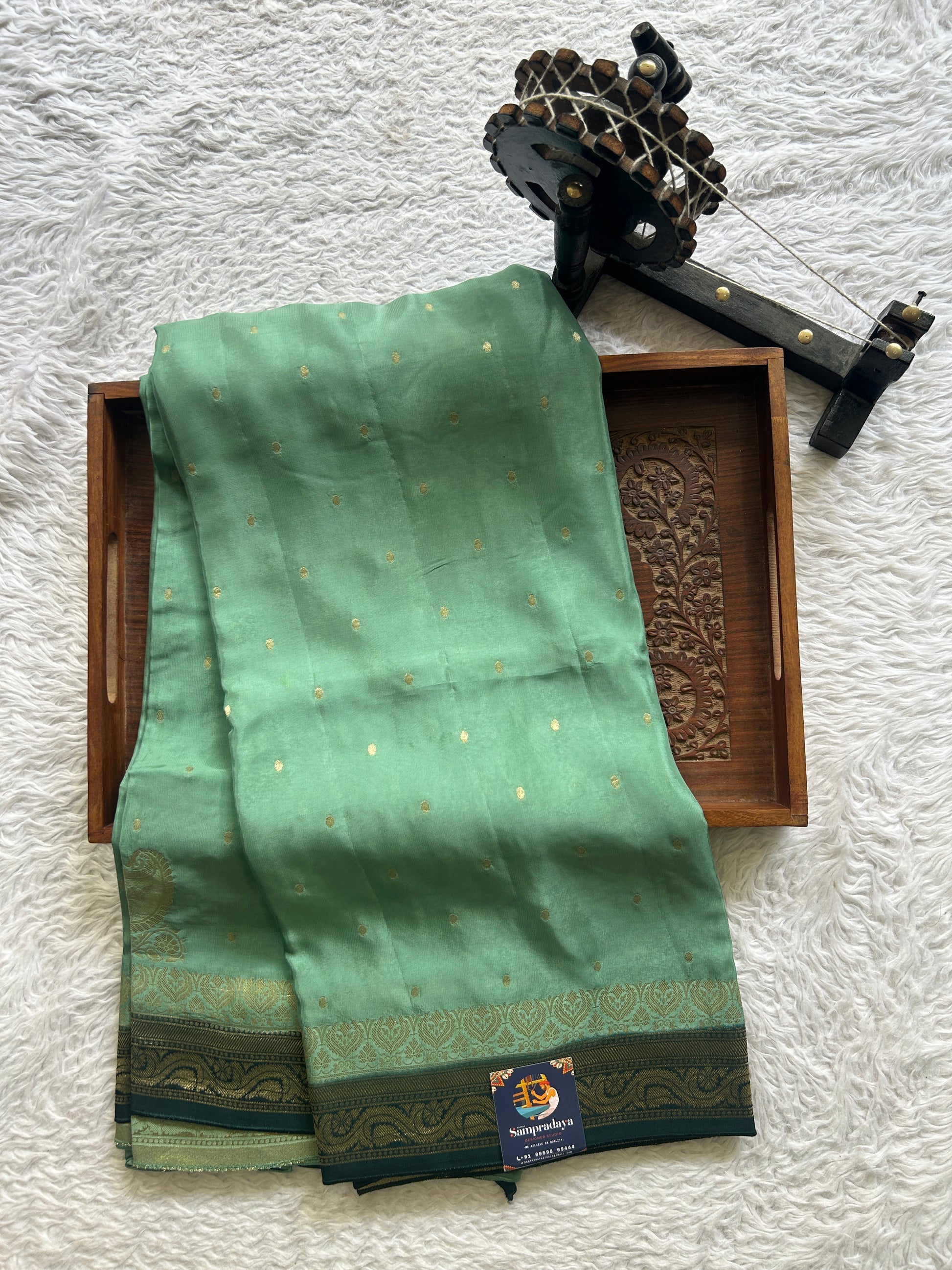Chiffon Fancy Saree Sage Green Colored Complemented with a Zari Border. - Sampradaya Designer Studio