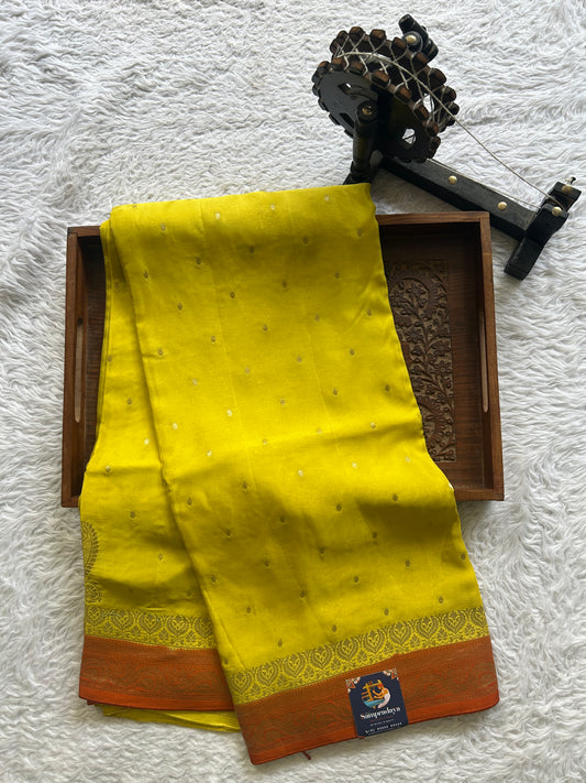 Chiffon Fancy Saree Yellow Colored Complemented With Orange Colored With a Zari Border - Sampradaya Designer Studio