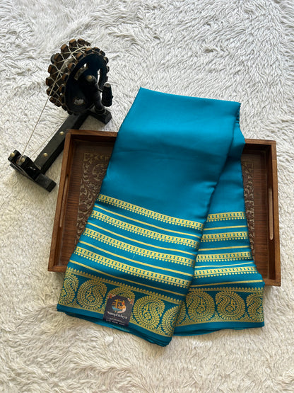 Peacock Blue Mysore Crepe Silk Saree with Silver Zari Border | Pure Handloom | Silk Mark Certified - Sampradaya Designer Studio