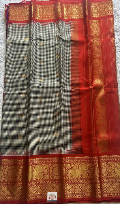 Gadwal Pattu Saree Black Colored Complemented With a Zari Border - Sampradaya Designer Studio