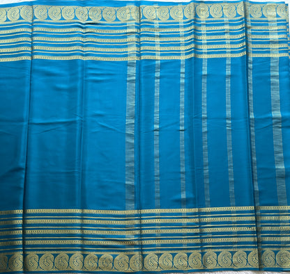 Peacock Blue Mysore Crepe Silk Saree with Silver Zari Border | Pure Handloom | Silk Mark Certified - Sampradaya Designer Studio