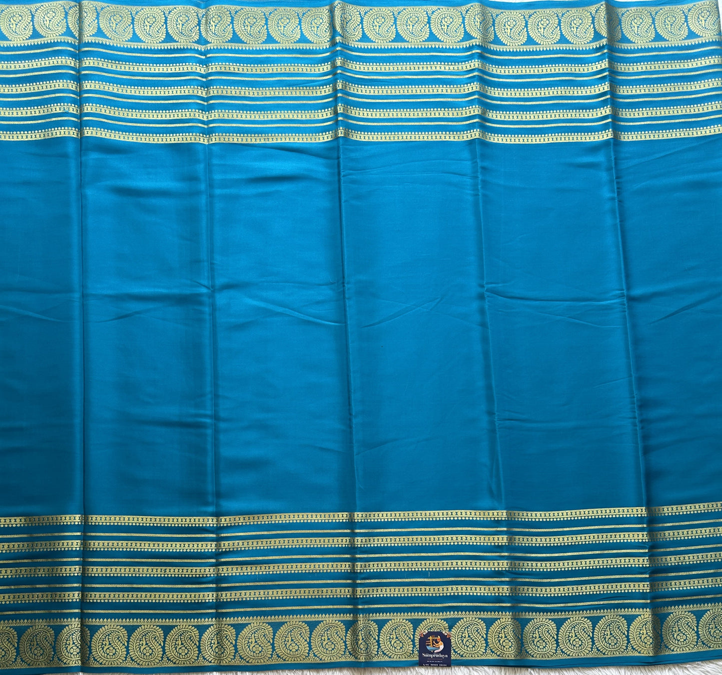 Peacock Blue Mysore Crepe Silk Saree with Silver Zari Border | Pure Handloom | Silk Mark Certified - Sampradaya Designer Studio