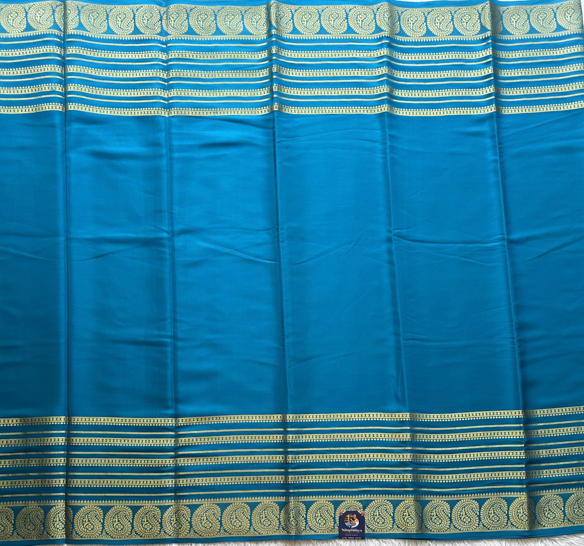 Peacock Blue Mysore Crepe Silk Saree with Silver Zari Border | Pure Handloom | Silk Mark Certified - Sampradaya Designer Studio