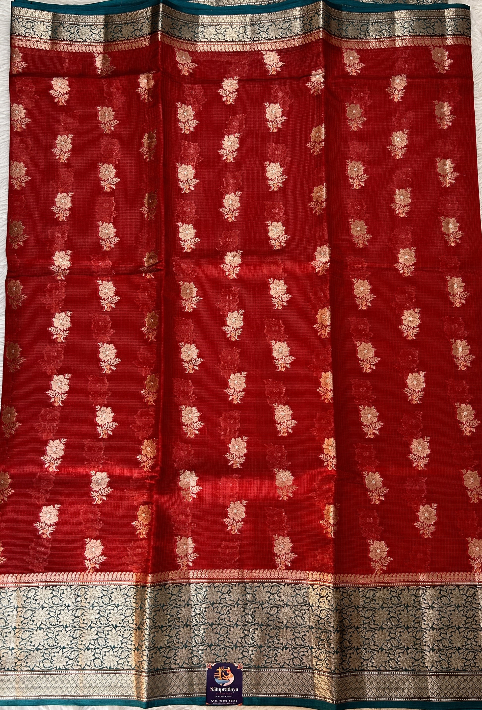 Silk kota Saree Red color complemented with a Bottle Green Color Zari Weaving Border. - Sampradaya Designer Studio