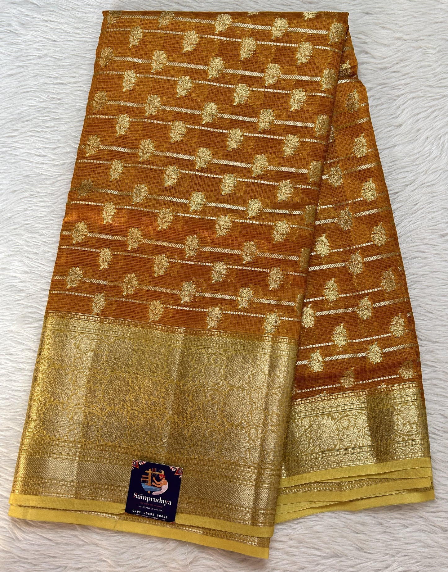 Silk kota Saree Orange color complemented with a Light Yellow Color Zari Weaving Border. - Sampradaya Designer Studio