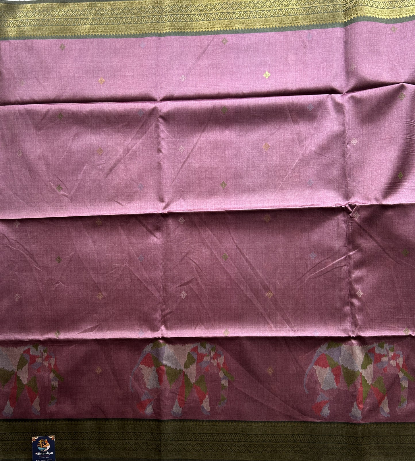 Semi Tussar Saree French Lilac Colored Complemented with a Olive Green Zari Border. - Sampradaya Designer Studio