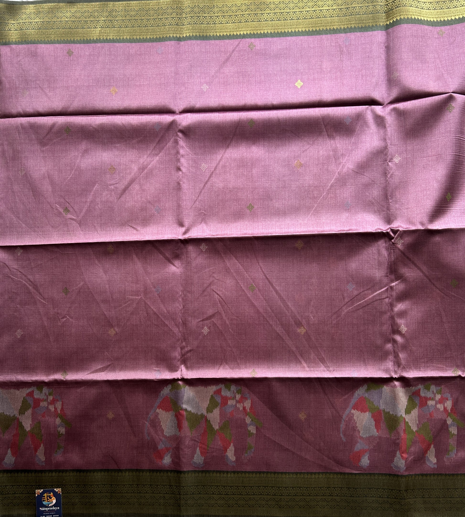 Semi Tussar Saree French Lilac Colored Complemented with a Olive Green Zari Border. - Sampradaya Designer Studio