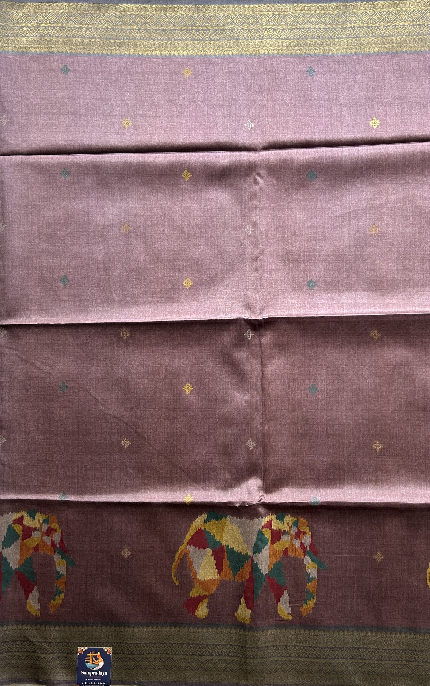 Semi Tussar Saree Light Grape Wine Colored Complemented with a Zari Border. - Sampradaya Designer Studio