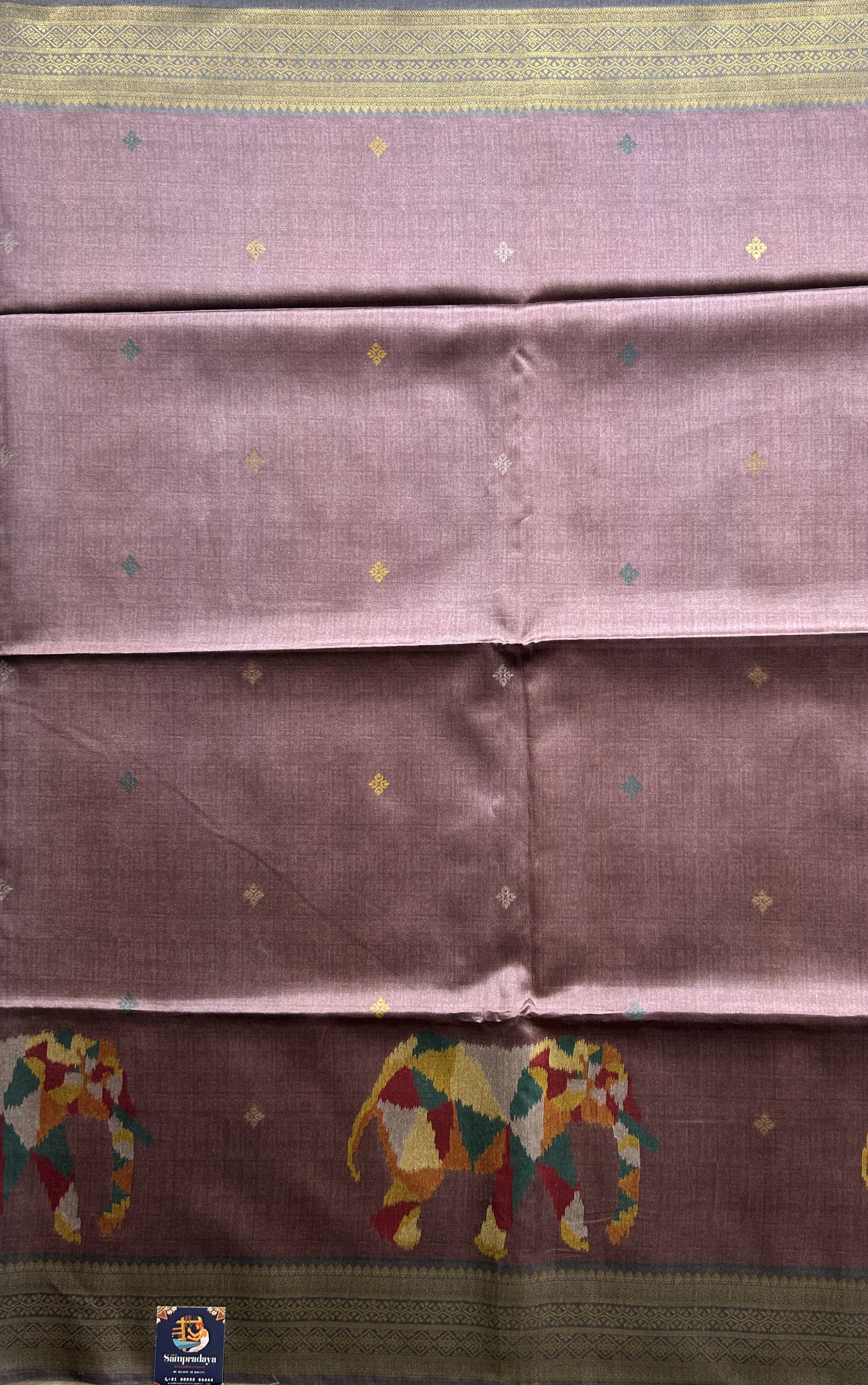 Semi Tussar Saree Light Grape Wine Colored Complemented with a Zari Border. - Sampradaya Designer Studio