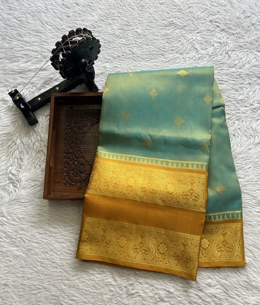 Venkatagiri Pattu Saree Sea Blue Complemented With a Mustard Color Zari Border. - Sampradaya Designer Studio