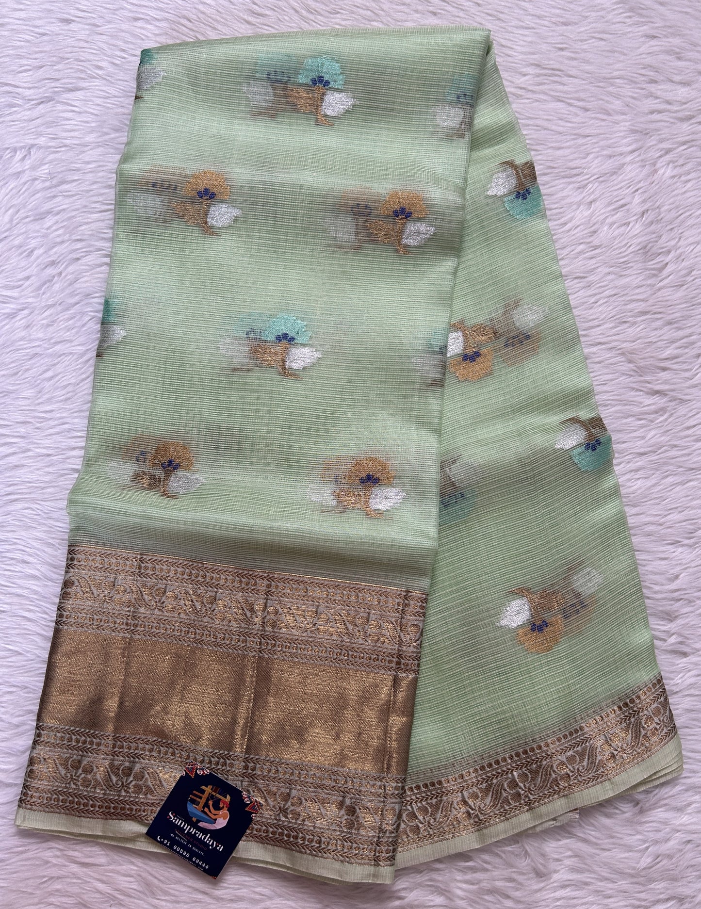 Silk kota Saree Green color complemented with a Gold Zari Weaving Border. - Sampradaya Designer Studio