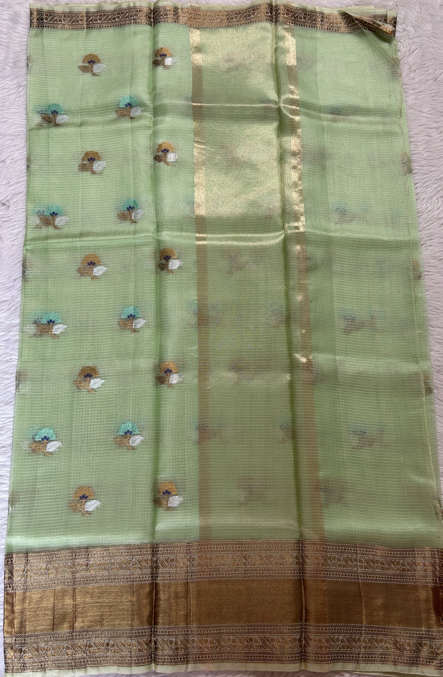 Silk kota Saree Green color complemented with a Gold Zari Weaving Border. - Sampradaya Designer Studio