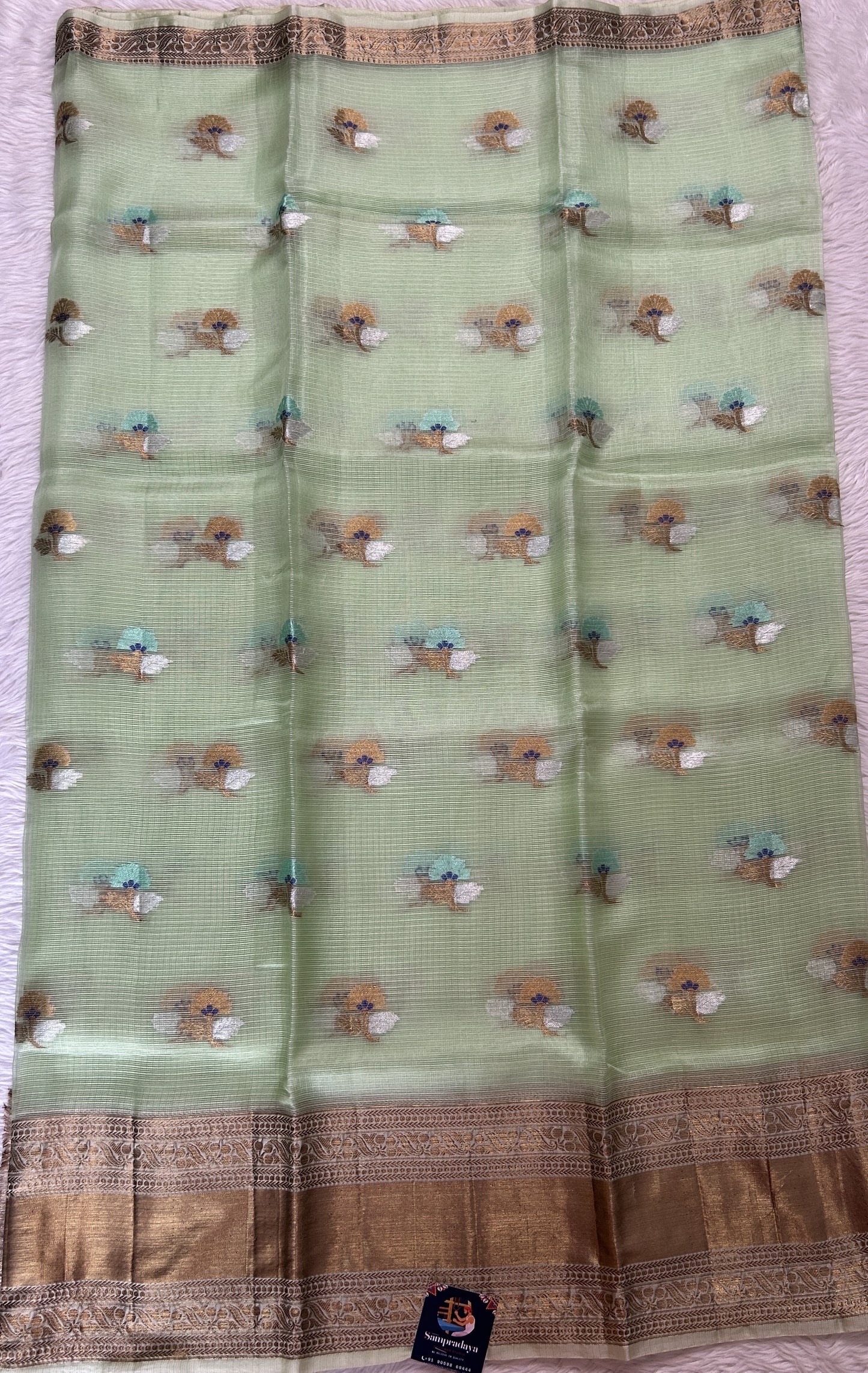 Silk kota Saree Green color complemented with a Gold Zari Weaving Border. - Sampradaya Designer Studio