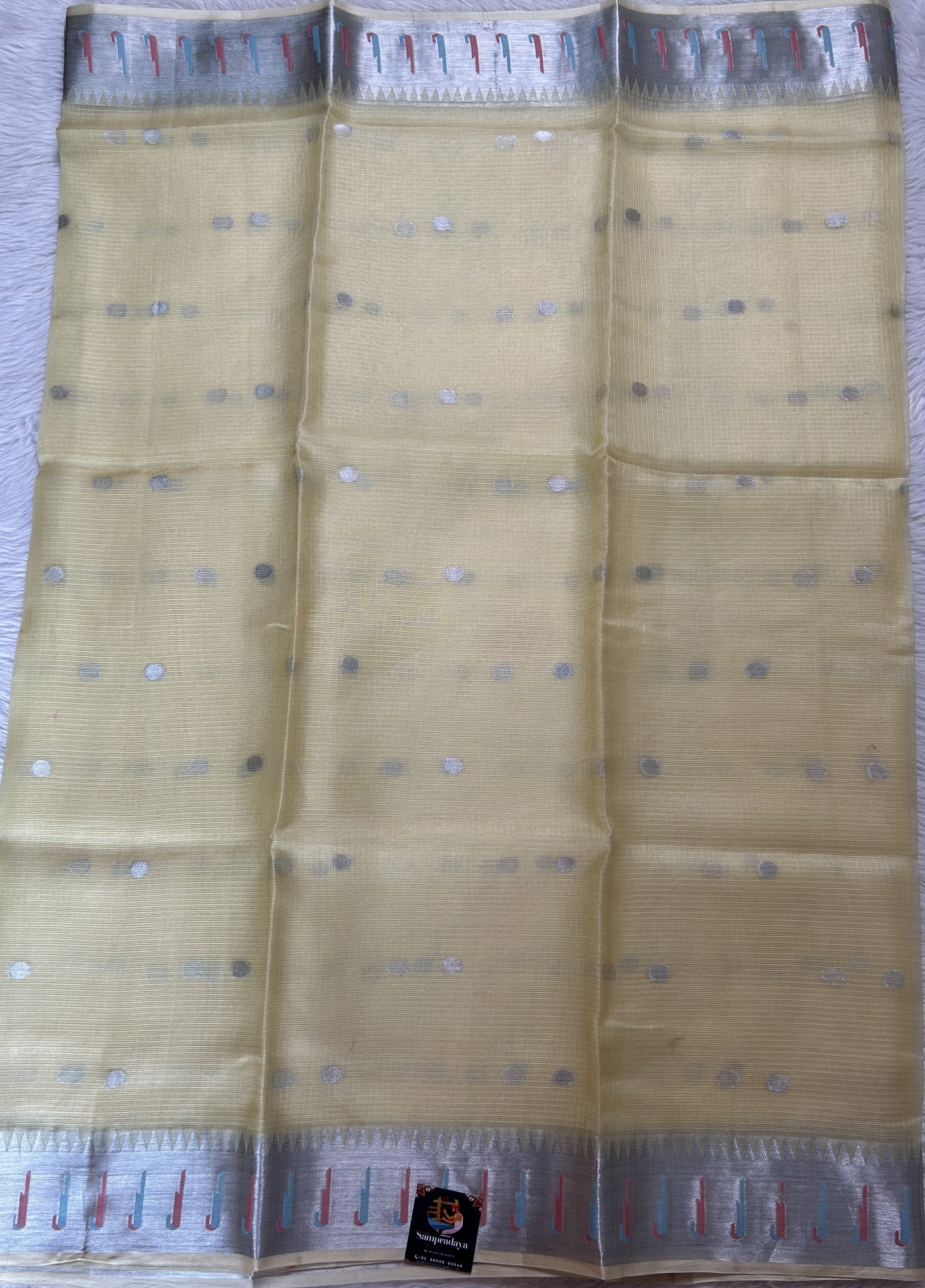 Silk kota Saree Yellow color complemented with a Zari Weaving Border. - Sampradaya Designer Studio