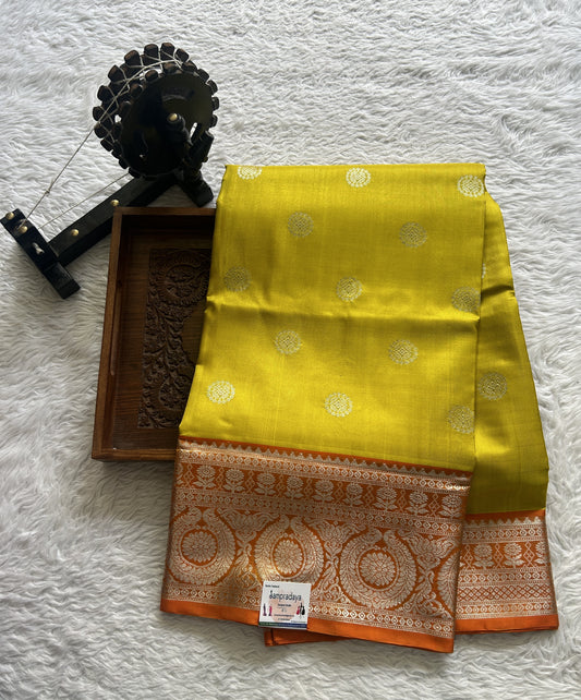 Venkatagiri Pattu Saree Yellow Colored Complemented With a Orange Color Zari Border. - Sampradaya Designer Studio