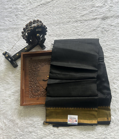 Mangalagiri Plain Pattu Saree Black colored complemented with a Zari Border - Sampradaya Designer Studio