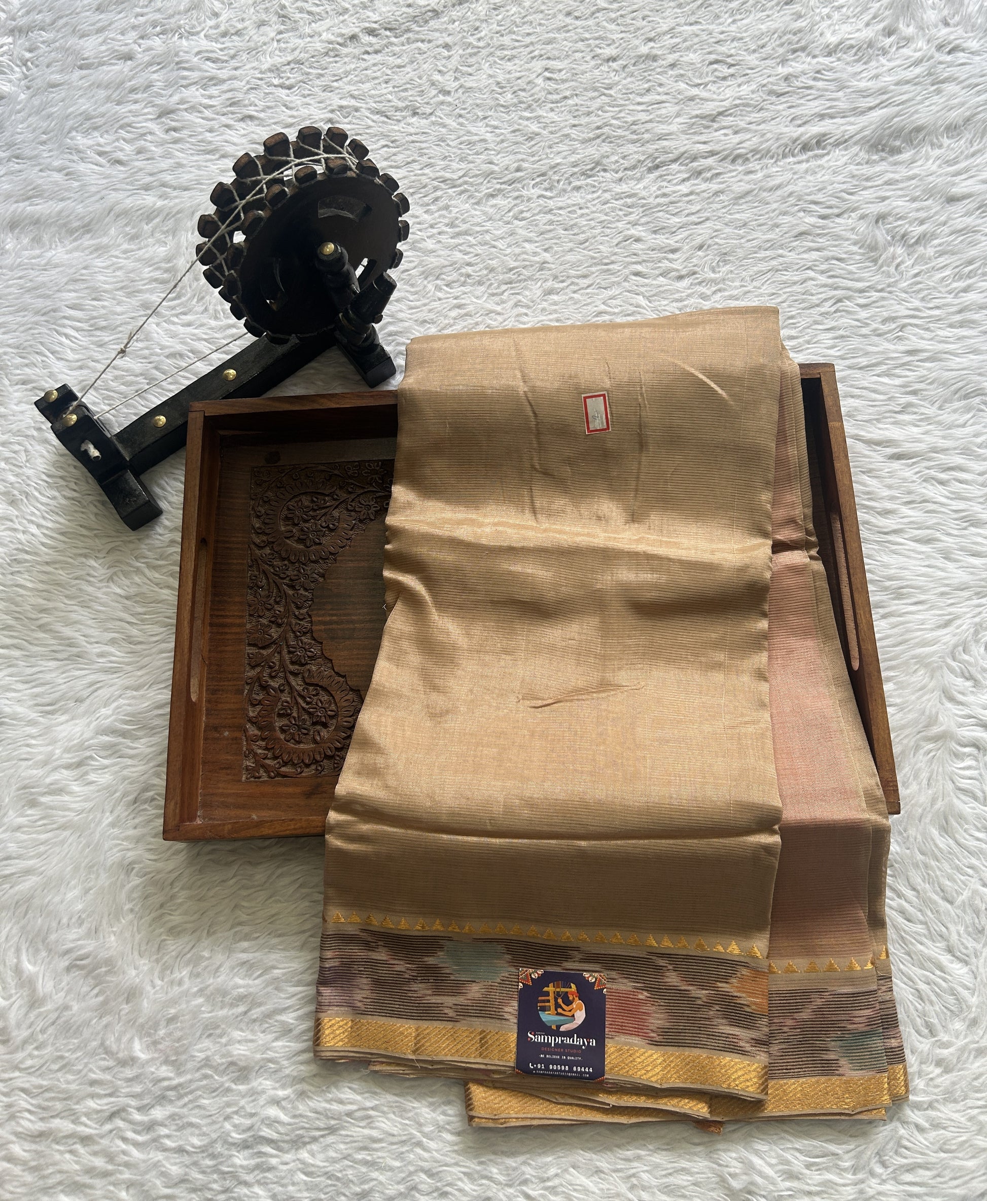 Mangalagiri Plain Pattu Saree Beige colored complemented with a Ikkat Border. - Sampradaya Designer Studio