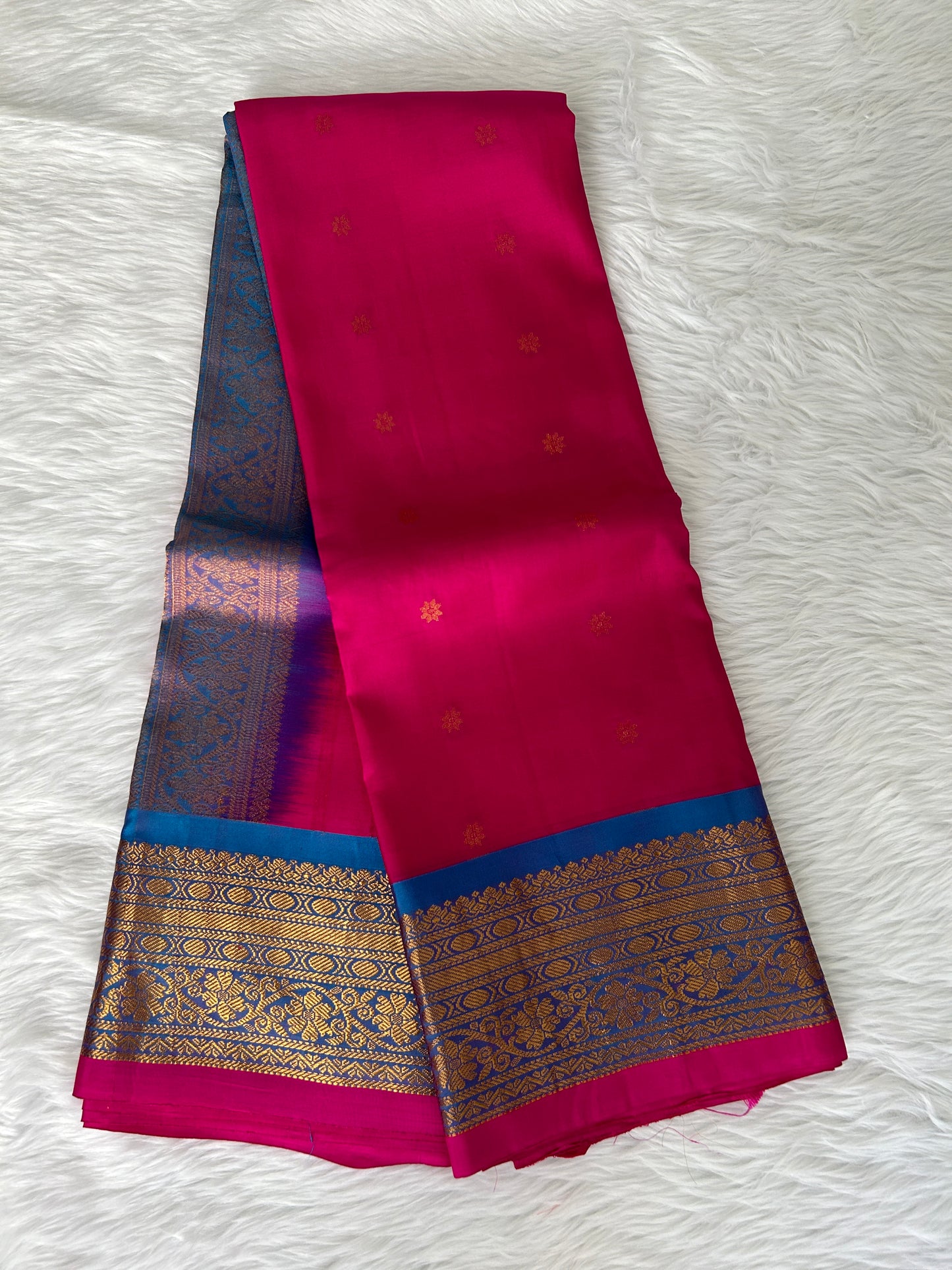 Gadwal Pattu Saree Hot Pink-colored saree complemented with a Blue border - Sampradaya Designer Studio