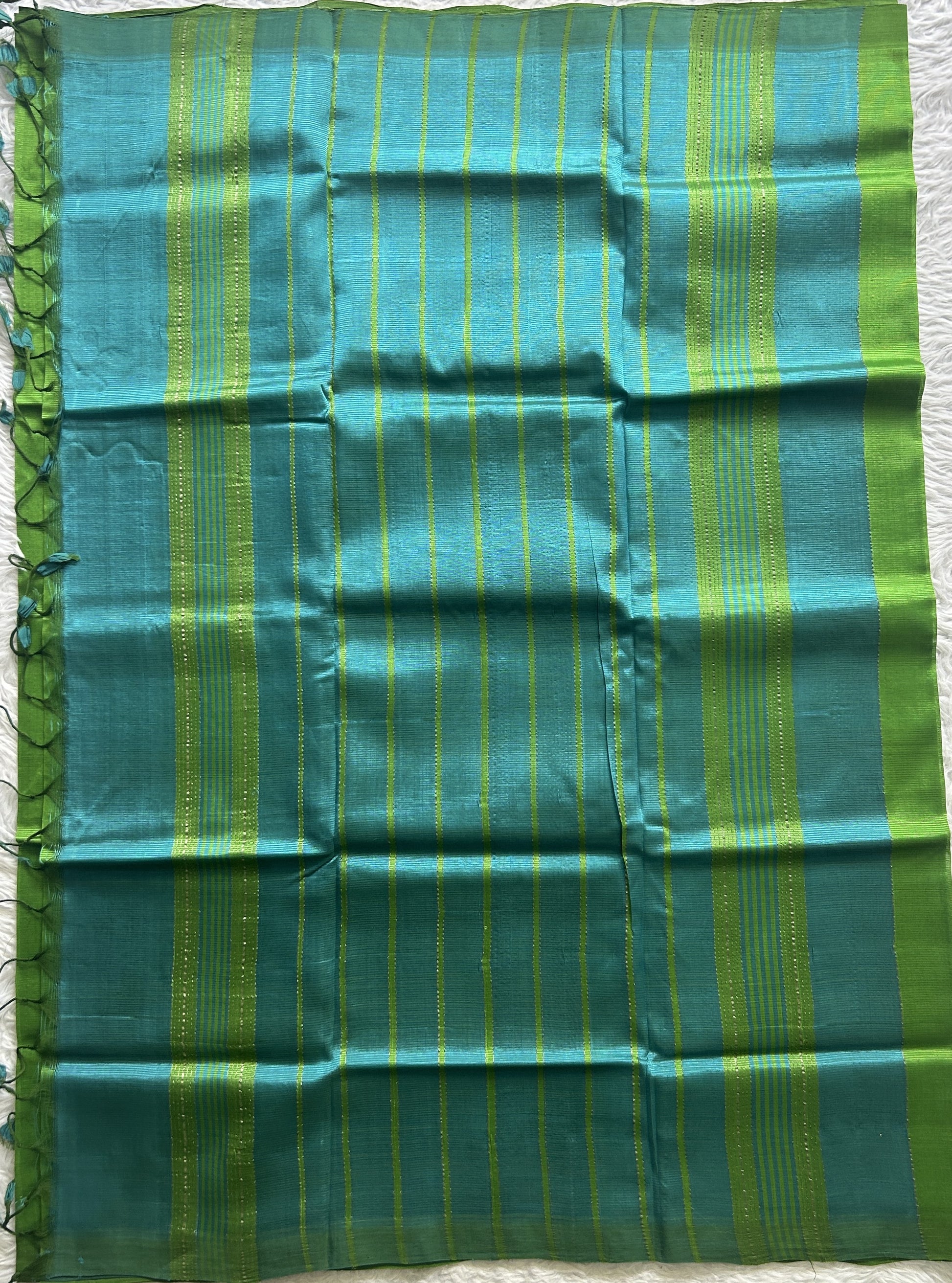 Mangalagiri Plain Pattu Saree Parrot Green colored complemented with a No Border. - Sampradaya Designer Studio