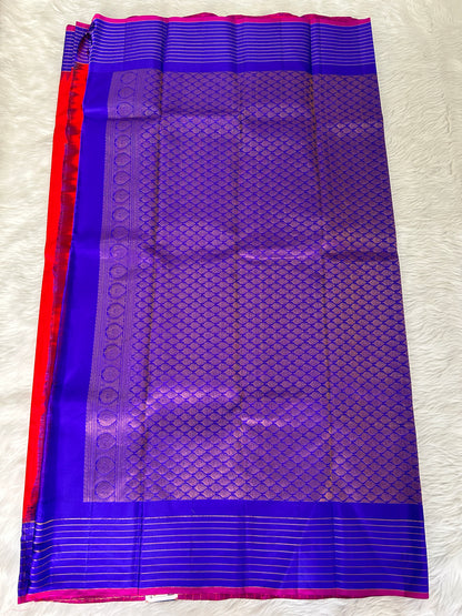 Gadwal Pattu Saree Blood Red-colored saree complemented with a Navy Blue border - Sampradaya Designer Studio