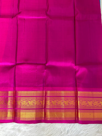 Gadwal Pattu Saree Deep Sea Blue-colored saree complemented with a magenta pink border - Sampradaya Designer Studio