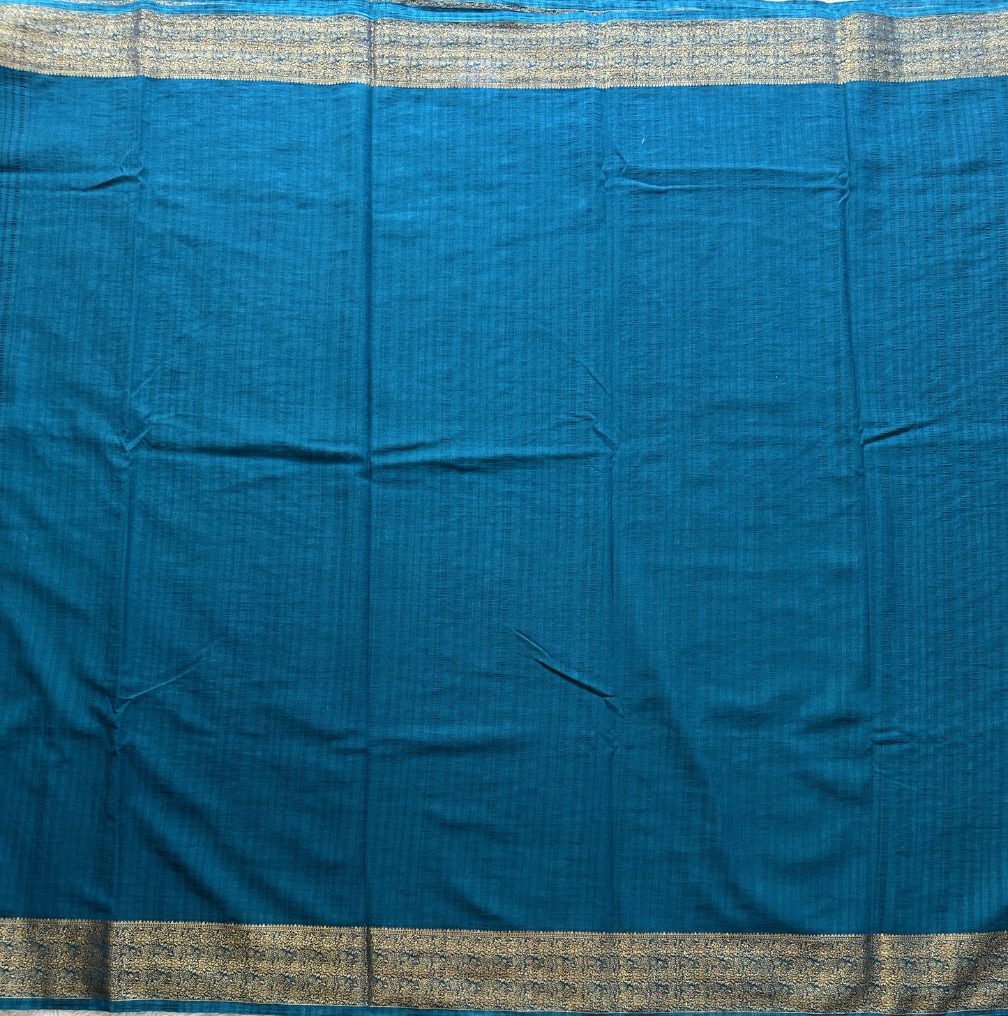 Peacock Blue Banarasi Semi Tussar Georgette Saree with Sliver Zari Border — Lightweight Festive Wear