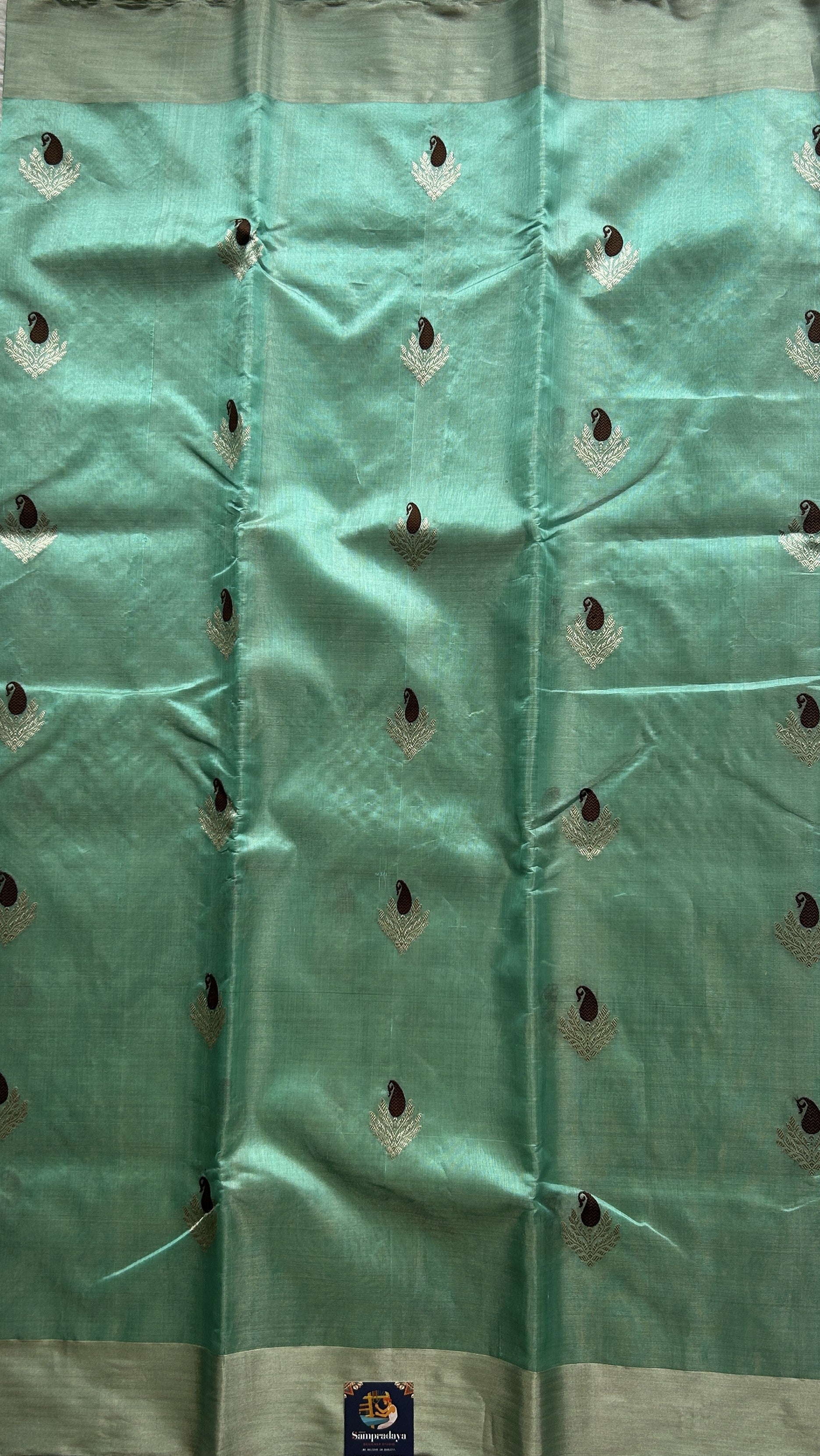 Chanderi Silk Saree Sea Green color Elegantly Paired with a Silver Zari border - Sampradaya Designer Studio