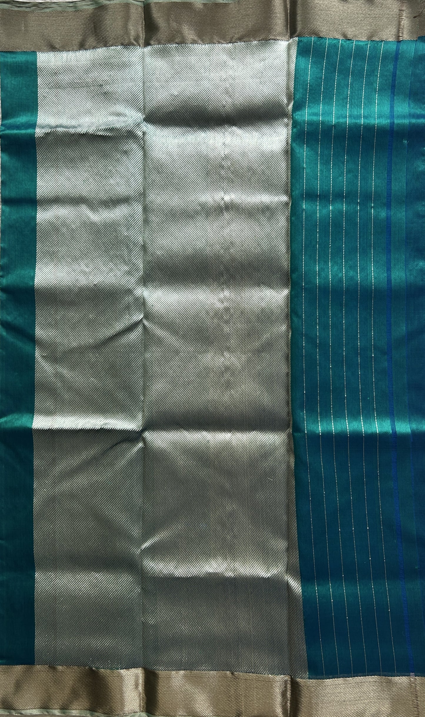 Chanderi Silk Saree Peacock Blue color Elegantly Paired with a Silver Zari border - Sampradaya Designer Studio
