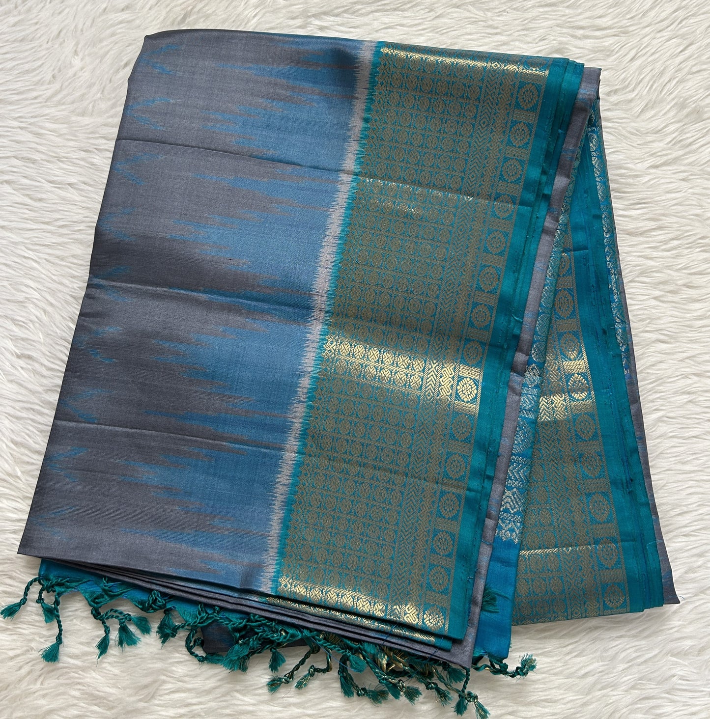 Kanjivaram Festive Soft Silk Saree Gray colored Saree complemented with a Blue Colored Kanchi border. - Sampradaya Designer Studio