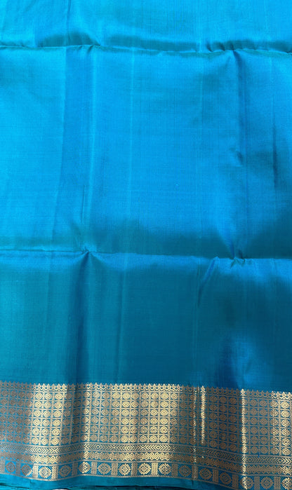 Kanjivaram Festive Soft Silk Saree Gray colored Saree complemented with a Blue Colored Kanchi border. - Sampradaya Designer Studio