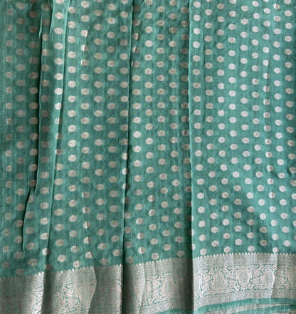 Peacock Green Banarasi Semi Tussar Georgette Saree with Sliver Zari Border — Lightweight Festive Wear