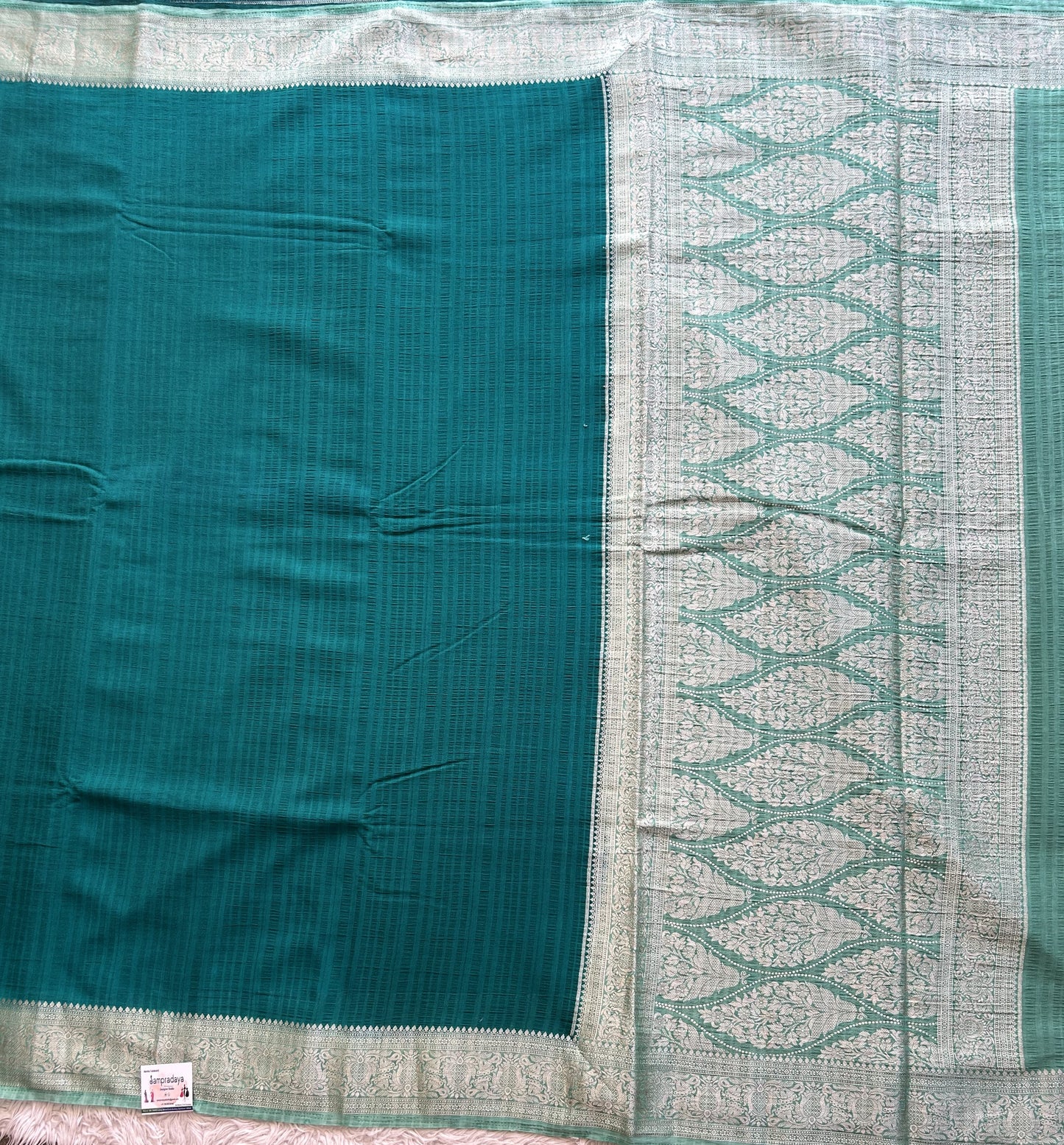Peacock Green Banarasi Semi Tussar Georgette Saree with Sliver Zari Border — Lightweight Festive Wear