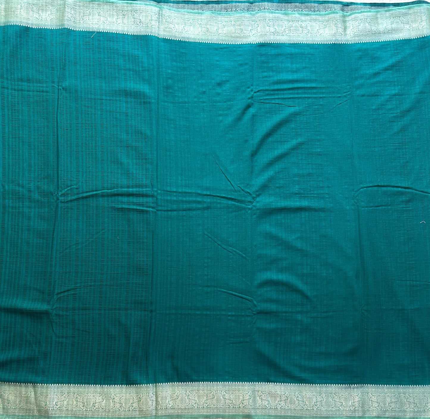 Peacock Green Banarasi Semi Tussar Georgette Saree with Sliver Zari Border — Lightweight Festive Wear