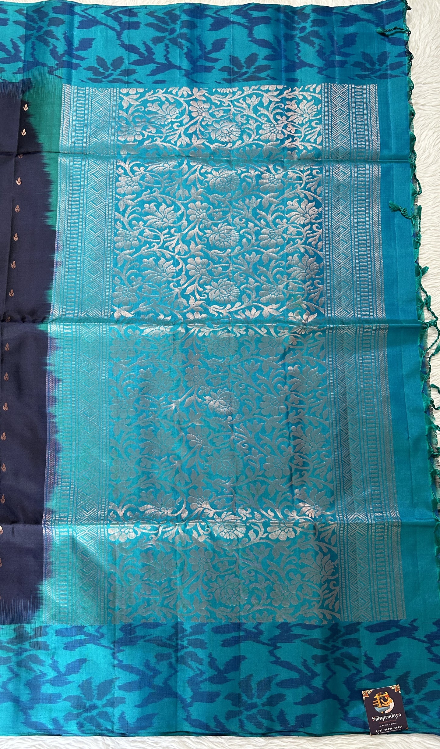 Kanjivaram Festive Soft Silk Saree Prussian Blue colored Saree complemented with a Turquoise Blue Colored Pochampally border. - Sampradaya Designer Studio
