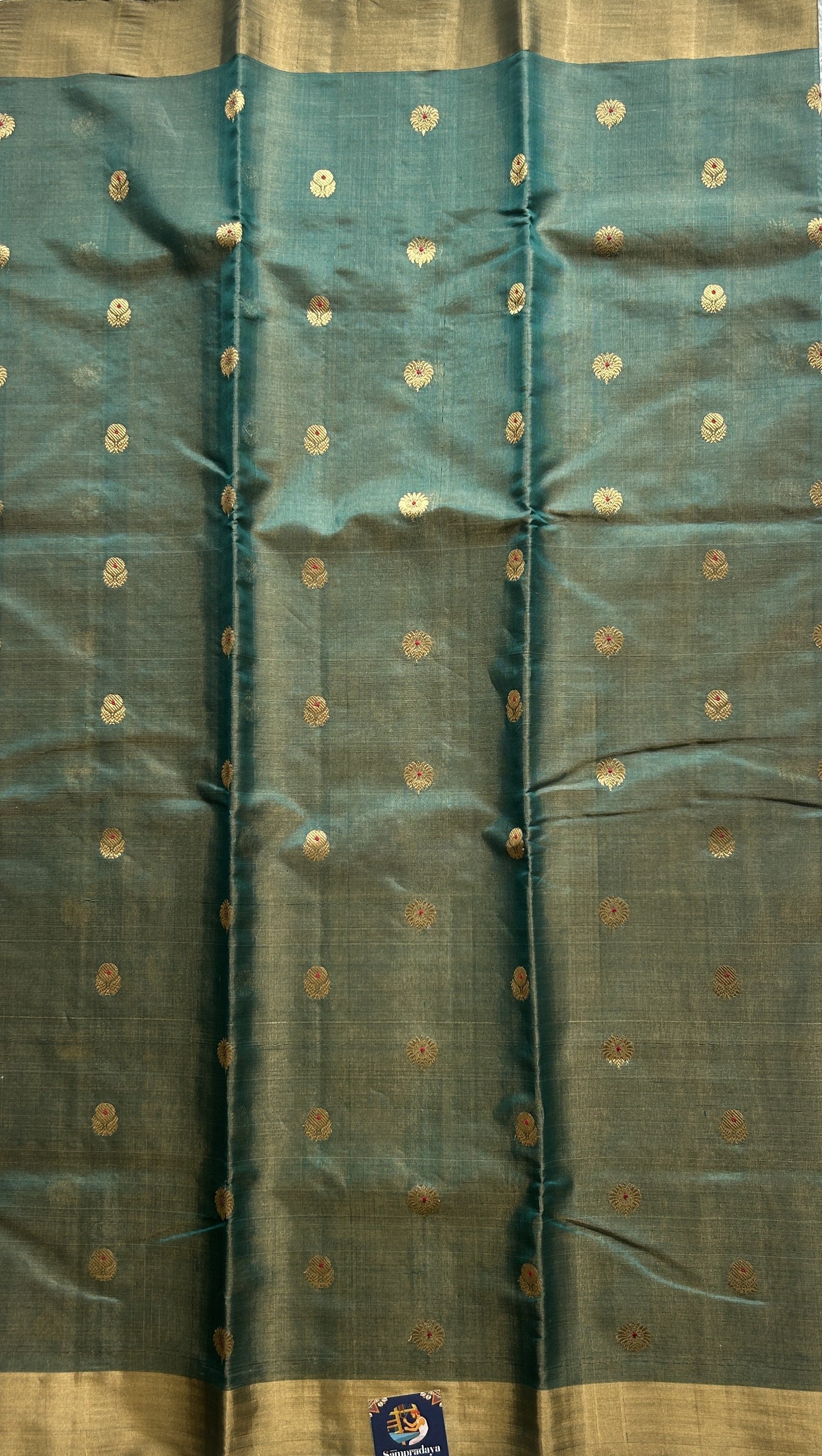 Chanderi Silk Saree Turquoise Green color Elegantly Paired with a Gold Zari border - Sampradaya Designer Studio
