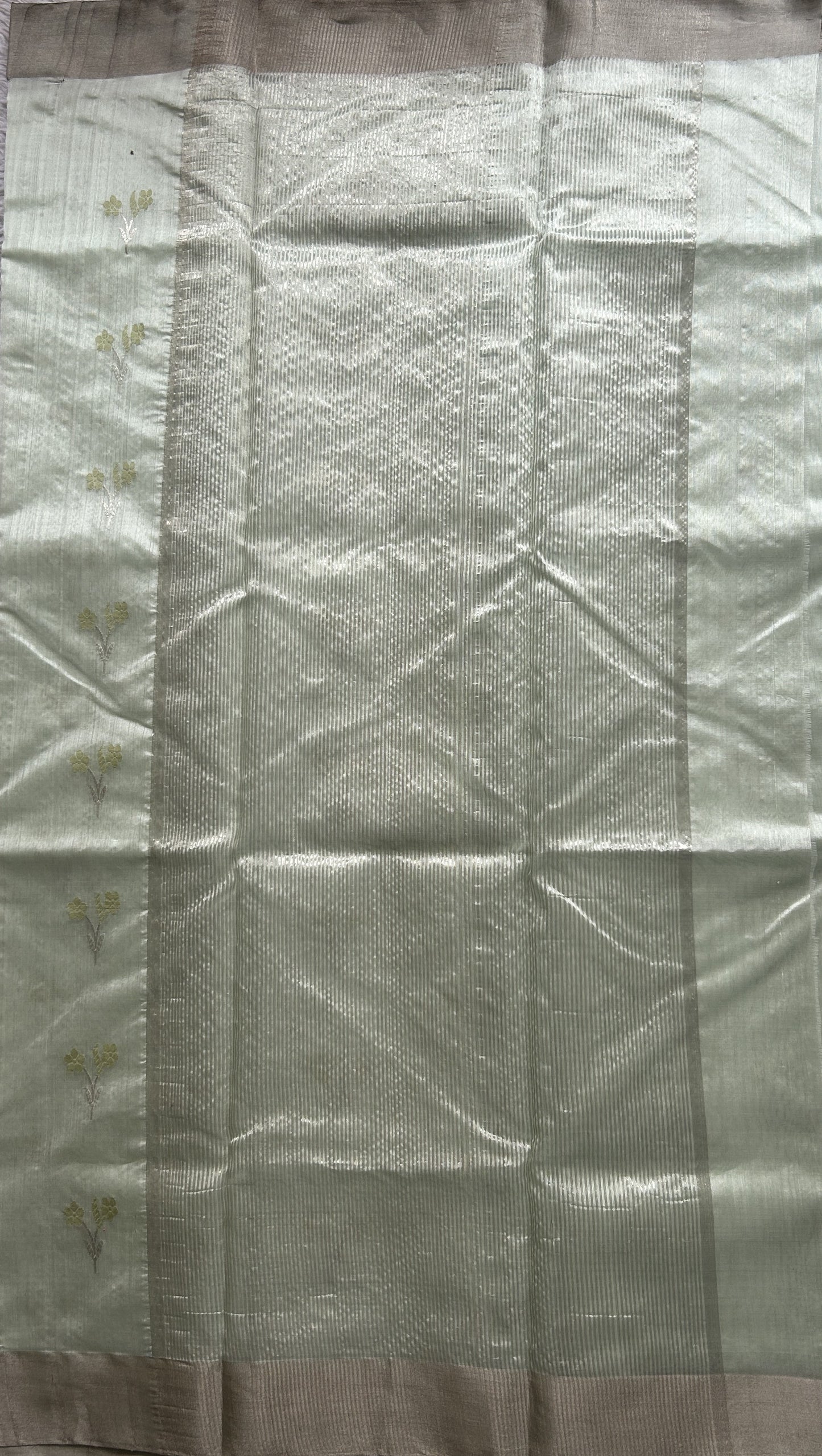 Chanderi Silk Saree Light Mint Green color Elegantly Paired with a Silver Zari border - Sampradaya Designer Studio