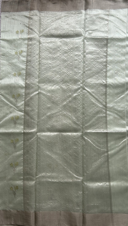 Chanderi Silk Saree Light Mint Green color Elegantly Paired with a Silver Zari border - Sampradaya Designer Studio