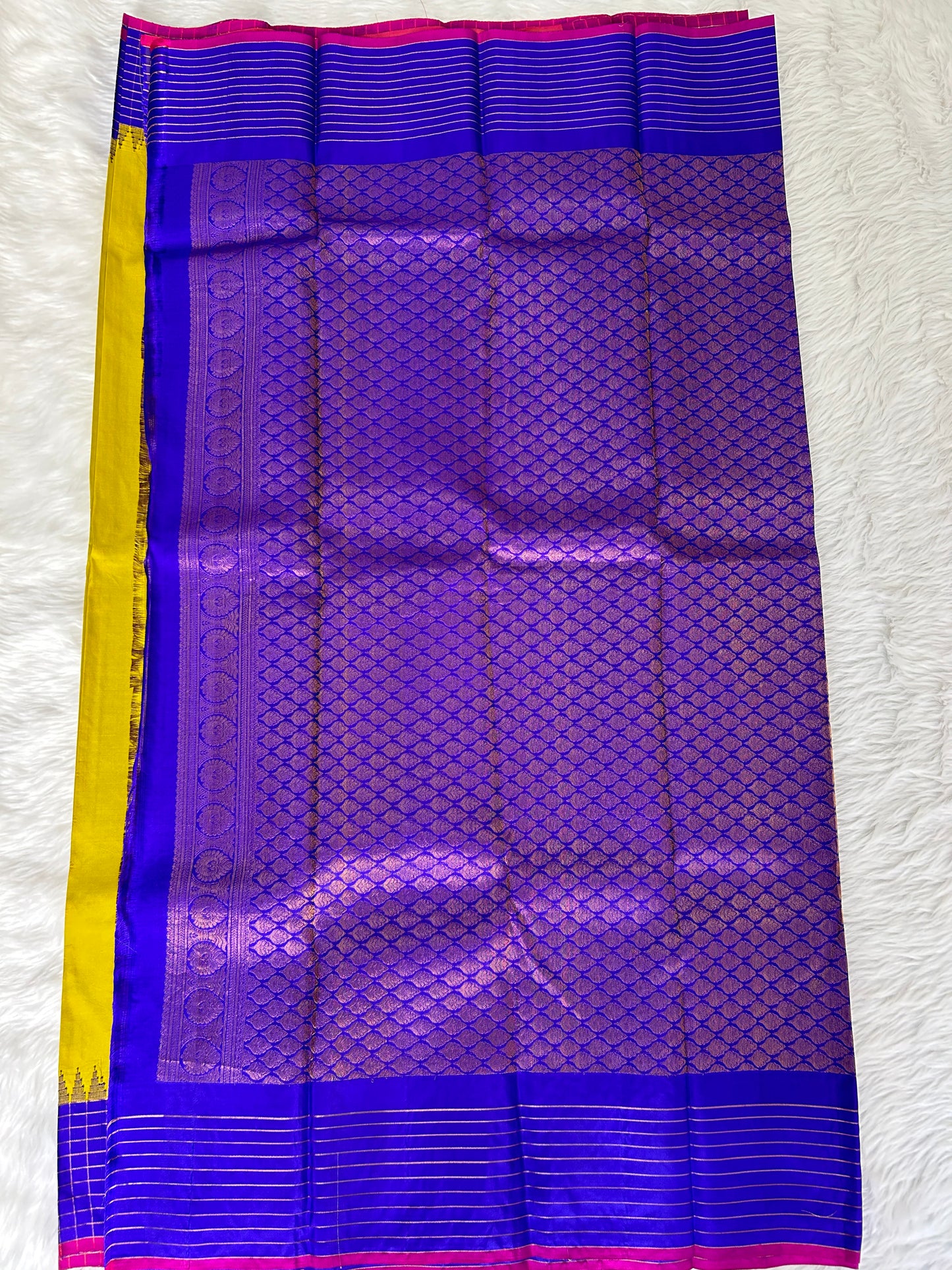 Gadwal Pattu Saree Lemon Yellow colored saree complemented with a Royal Blue border - Sampradaya Designer Studio
