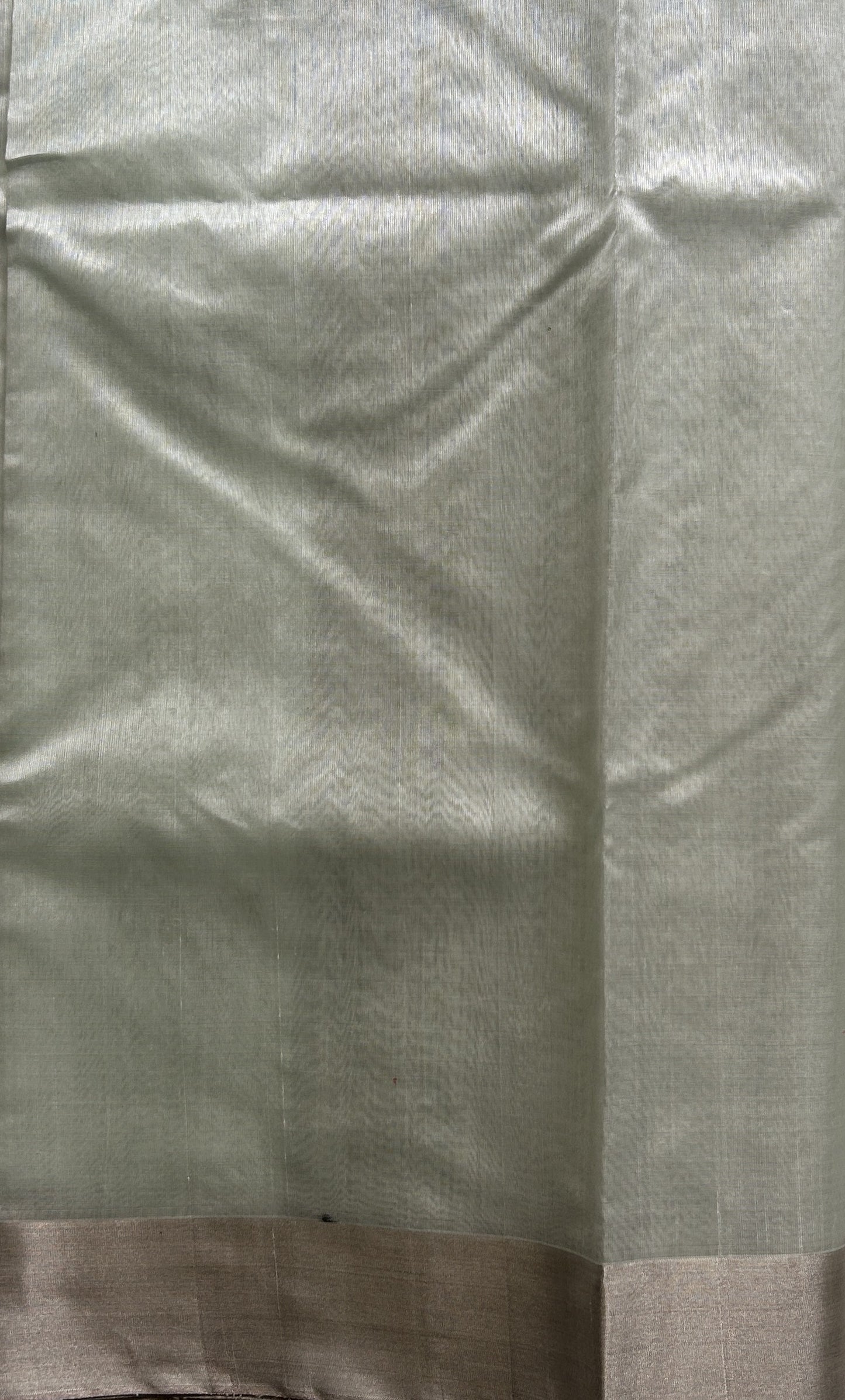 Chanderi Silk Saree Light Mint Green color Elegantly Paired with a Silver Zari border - Sampradaya Designer Studio