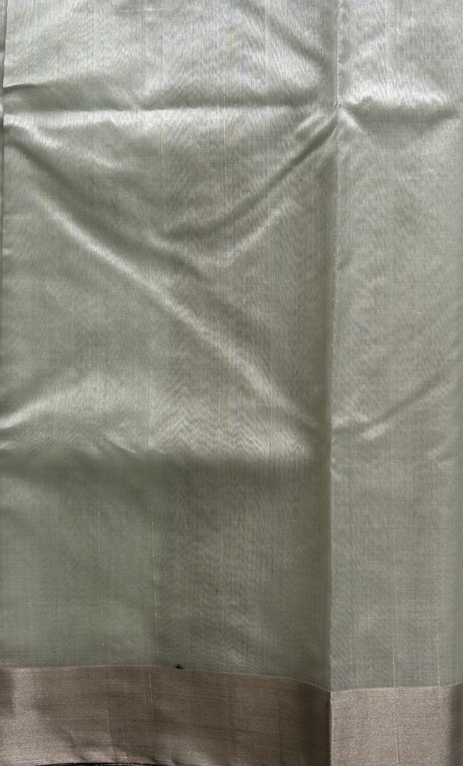 Chanderi Silk Saree Light Mint Green color Elegantly Paired with a Silver Zari border - Sampradaya Designer Studio