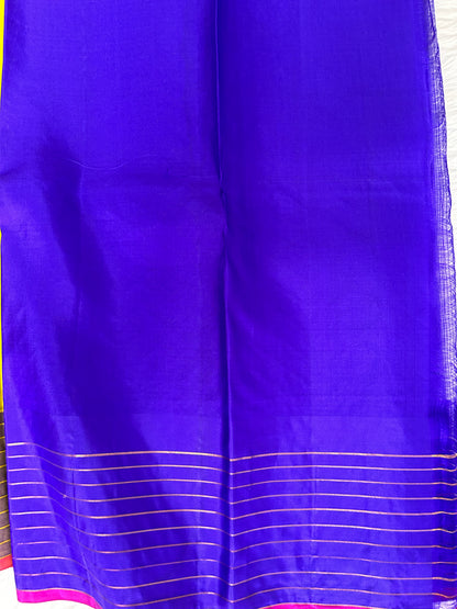 Gadwal Pattu Saree Lemon Yellow colored saree complemented with a Royal Blue border - Sampradaya Designer Studio